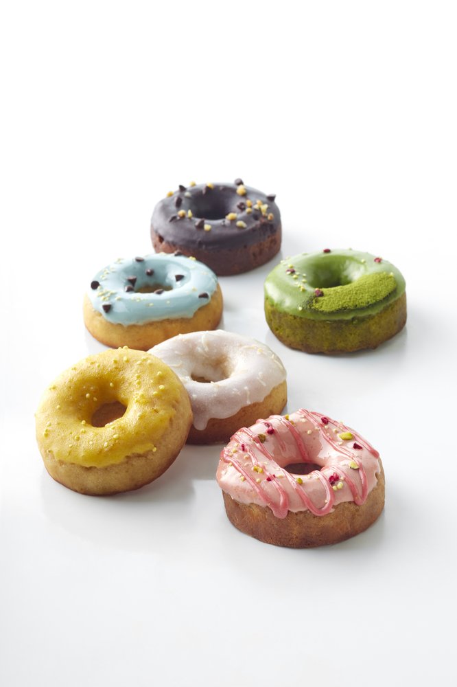 Colorful glazed cake donuts