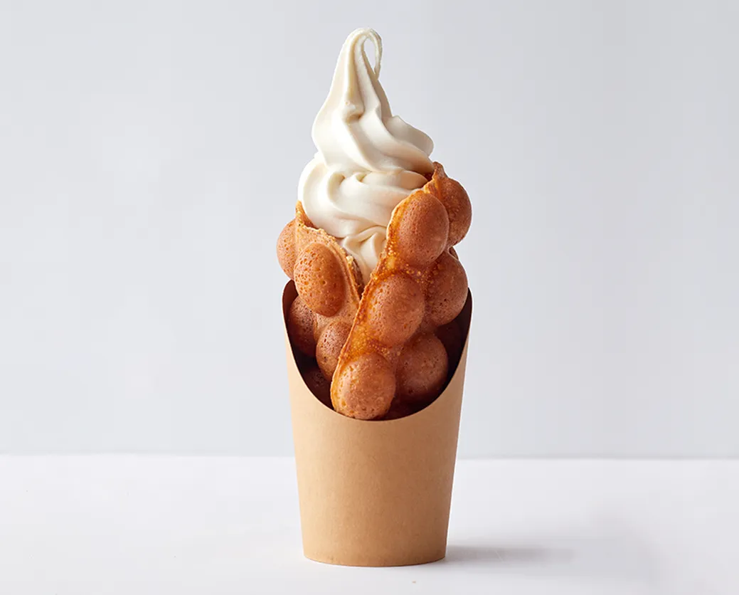Bubble waffle filled with soy milk soft serve