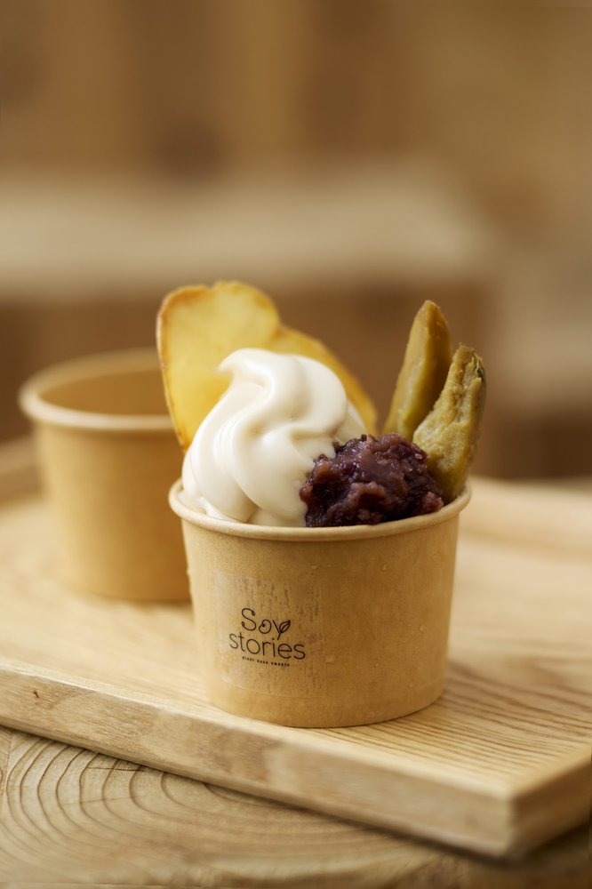 Seasonal soft serve cup with sweet potato on a wooden tray